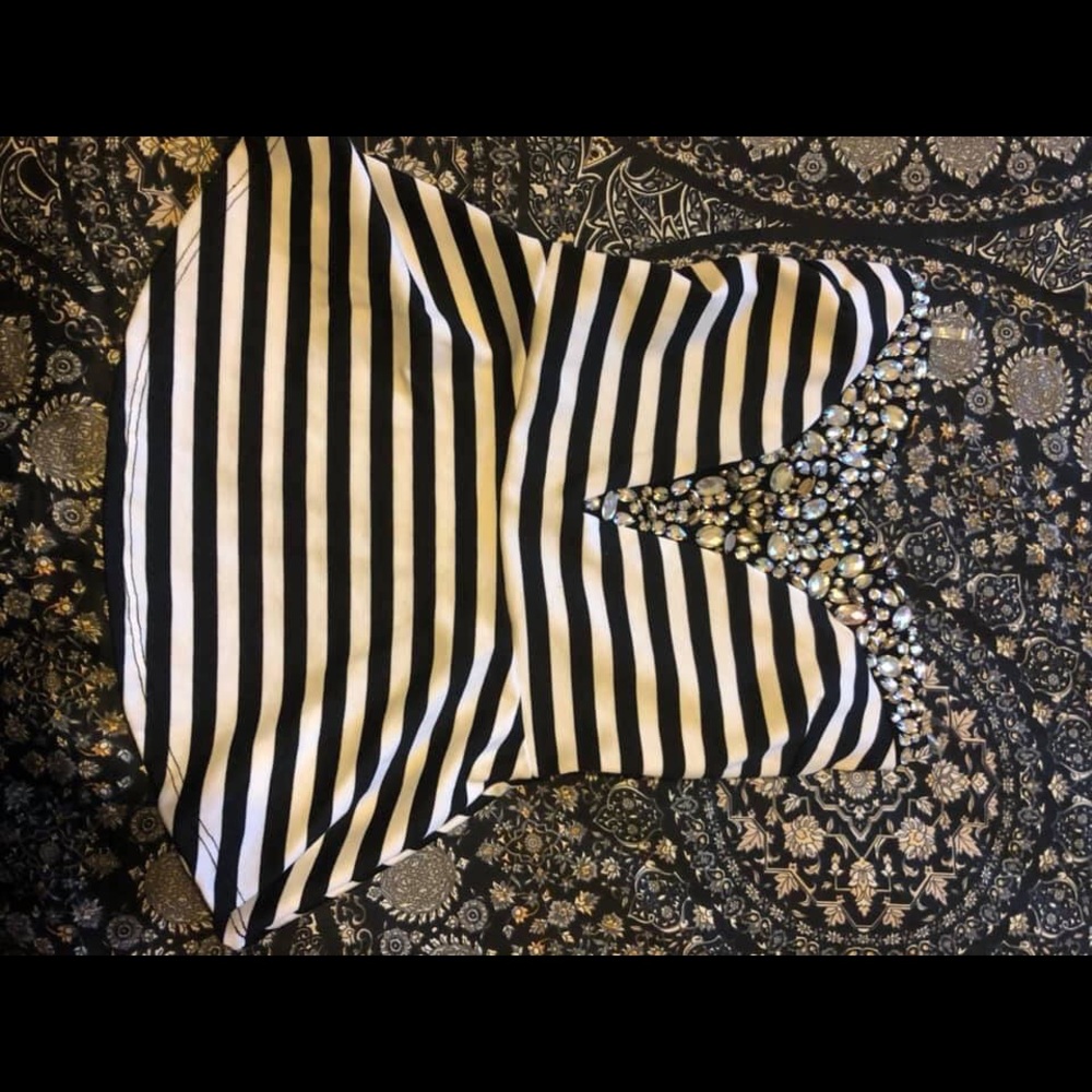 Striped and jeweled peplum top